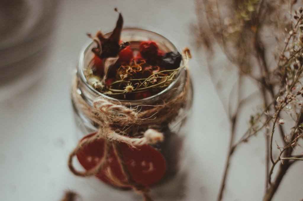 selective focus photo of jar filled with spices